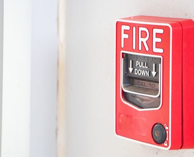 red-fire-alarm-system-on-wall-scaled